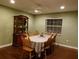 Dining room with wood table and chairs at 4131 Yorketowne Rd, Orlando, FL 32812