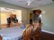 Bright dining room with hardwood floors and wood table and chairs at 4131 Yorketowne Rd, Orlando, FL 32812