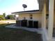 Home's exterior showing AC unit and storage area at 4131 Yorketowne Rd, Orlando, FL 32812