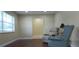 Bright living room with hardwood floors, a large window, and comfortable seating at 4131 Yorketowne Rd, Orlando, FL 32812