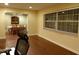 Living room with hardwood floors and view to dining area at 4131 Yorketowne Rd, Orlando, FL 32812