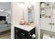 Modern bathroom with floating vanity and open shelving at 436 E Jersey St, Orlando, FL 32806