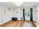 Bright bedroom with wood-look floors and ample closet space at 436 E Jersey St, Orlando, FL 32806