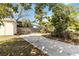 Curved driveway leading to backyard and shed at 436 E Jersey St, Orlando, FL 32806