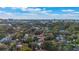 Aerial view of a house in a residential area with city skyline in the background at 512 E Gore St, Orlando, FL 32806