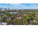 Aerial view of a residential neighborhood near a lake and the city skyline at 512 E Gore St, Orlando, FL 32806