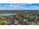 Aerial view showcasing a lakefront home nestled in a charming neighborhood at 512 E Gore St, Orlando, FL 32806