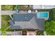 Aerial view showing house, pool, and surrounding landscape at 512 E Gore St, Orlando, FL 32806