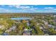 Aerial view of a home located in a tree-lined neighborhood near a lake at 512 E Gore St, Orlando, FL 32806