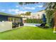 Private backyard with artificial turf and a pool at 512 E Gore St, Orlando, FL 32806