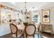 Bright dining area with a round table and chandelier at 512 E Gore St, Orlando, FL 32806