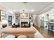 Living room with fireplace and built-in shelving at 512 E Gore St, Orlando, FL 32806