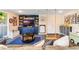 Playroom with built-in shelving, a swing, and a large TV at 512 E Gore St, Orlando, FL 32806