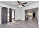 Bright dining room with grey flooring and access to the backyard at 520 Sw 38Th St, Ocala, FL 34471