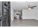 Bright and airy entryway with gray laminate floors, leading to the living area at 520 Sw 38Th St, Ocala, FL 34471