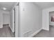 Hallway features a closet, updated paint, and flooring at 520 Sw 38Th St, Ocala, FL 34471