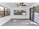 Living room with two windows and a sliding glass door for natural light at 520 Sw 38Th St, Ocala, FL 34471