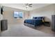 Comfortable bedroom with a large bed, nightstands and window at 5317 Jubiloso Dr, St Cloud, FL 34771