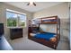 Functional bedroom with a bunk bed and dresser at 5317 Jubiloso Dr, St Cloud, FL 34771