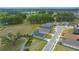 Aerial view of community with houses and green spaces at 5390 Nw 43Rd St, Ocala, FL 34482