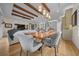 Elegant dining room showcasing a long wooden table and stylish seating at 5390 Nw 43Rd St, Ocala, FL 34482