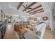 Modern kitchen with white cabinetry, a large island, and stainless steel appliances at 5390 Nw 43Rd St, Ocala, FL 34482