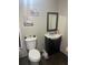 Clean bathroom, vanity, toilet and mirror at 6111 Bamboo Dr, Orlando, FL 32807