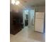 Kitchen with refrigerator and access to other rooms at 6111 Bamboo Dr, Orlando, FL 32807