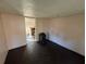 Empty bedroom with dark flooring and light walls at 641 W Beresford Rd, Deland, FL 32720