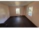 Simple bedroom with new flooring and neutral walls at 641 W Beresford Rd, Deland, FL 32720