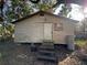 House exterior with wooden steps and water heater at 641 W Beresford Rd, Deland, FL 32720