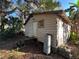 Small house with wooden siding and water heater at 641 W Beresford Rd, Deland, FL 32720