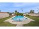 Relaxing pool area in a spacious backyard at 6517 Precourt Dr, Orlando, FL 32809