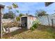 Rusty metal shed in backyard, needs work at 6517 Precourt Dr, Orlando, FL 32809