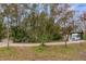 Circular driveway with brick pavers leading to the home at 8045 Happy Trl, Kissimmee, FL 34747