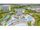 Aerial view of resort pool and beach area with bar at 8153 Surf St, Kissimmee, FL 34747