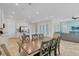 Farmhouse dining table in bright dining room at 8153 Surf St, Kissimmee, FL 34747