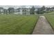 Peaceful community lake and walking path at 8211 Sun Spring Cir # 42, Orlando, FL 32825