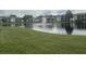 Serene community lake with fountain feature at 8211 Sun Spring Cir # 42, Orlando, FL 32825