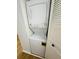 Stackable washer and dryer in convenient laundry closet at 8211 Sun Spring Cir # 42, Orlando, FL 32825