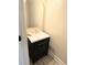 Clean bathroom with a contemporary vanity and a sleek mirror at 8407 Riverdale Ln, Davenport, FL 33896