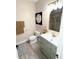 Stylish bathroom with a modern vanity and neutral tones at 8407 Riverdale Ln, Davenport, FL 33896