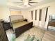 Spacious bedroom with plush carpeting, large bed, and plenty of natural light at 8407 Riverdale Ln, Davenport, FL 33896