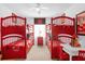 Bedroom with two sets of bunk beds and a Mickey Mouse theme at 8511 La Isla Dr, Kissimmee, FL 34747