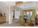 Formal dining room with a large table, chandelier, and green accents at 8511 La Isla Dr, Kissimmee, FL 34747