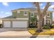 Two-story house with a two-car garage at 8511 La Isla Dr, Kissimmee, FL 34747