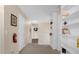 Upstairs hallway with built-in bookcases and stairway at 8511 La Isla Dr, Kissimmee, FL 34747