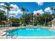 Large community pool with plenty of lounge chairs at 8511 La Isla Dr, Kissimmee, FL 34747
