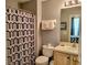 Simple bathroom with shower/tub combo and updated vanity at 8515 Sunrise Key Dr, Kissimmee, FL 34747