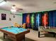 Game room with pool table and foosball table at 8515 Sunrise Key Dr, Kissimmee, FL 34747